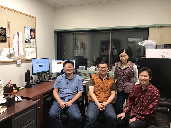 four team members in the lab