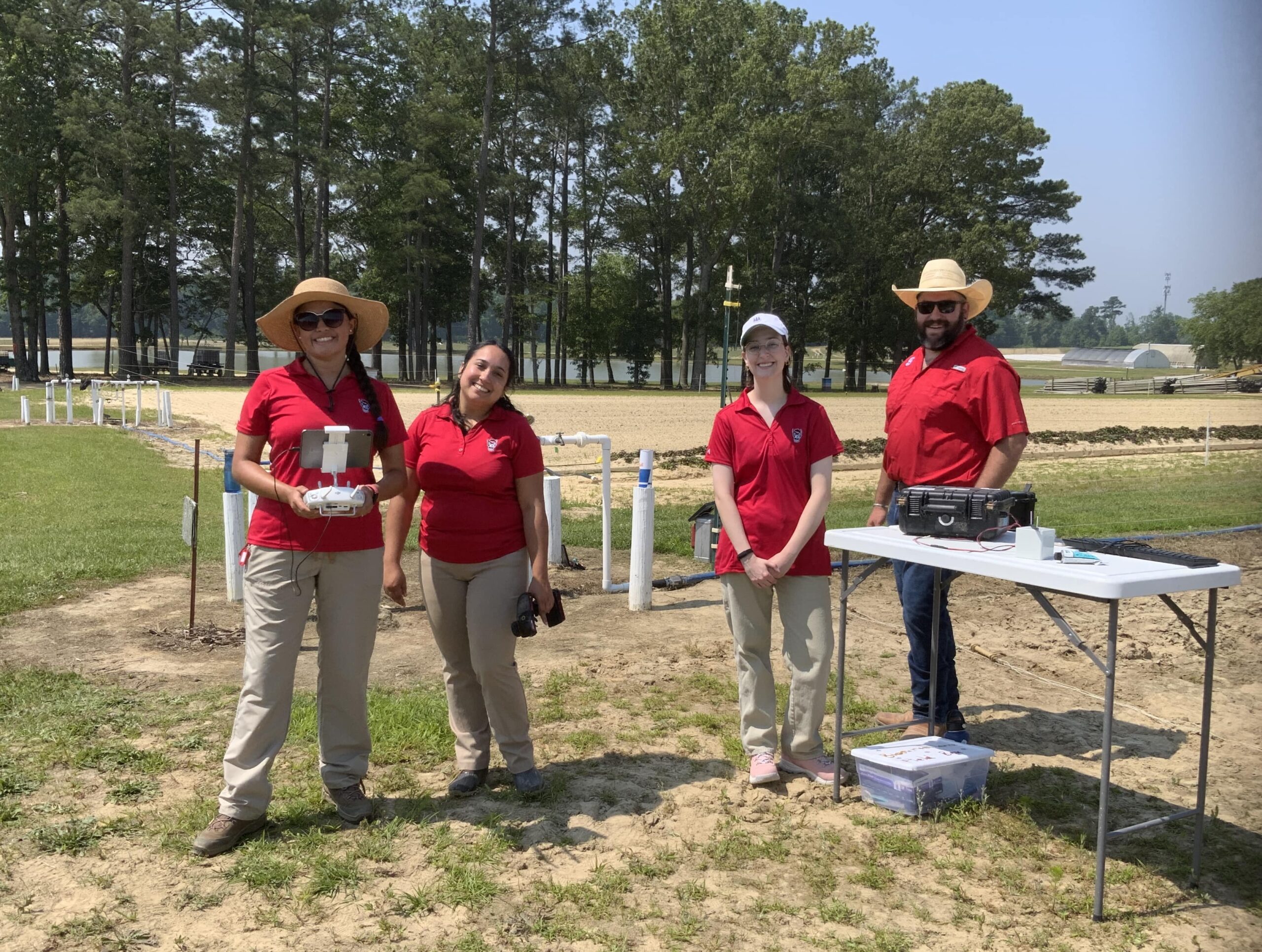 Yara is with with 3 members of the lab in the field